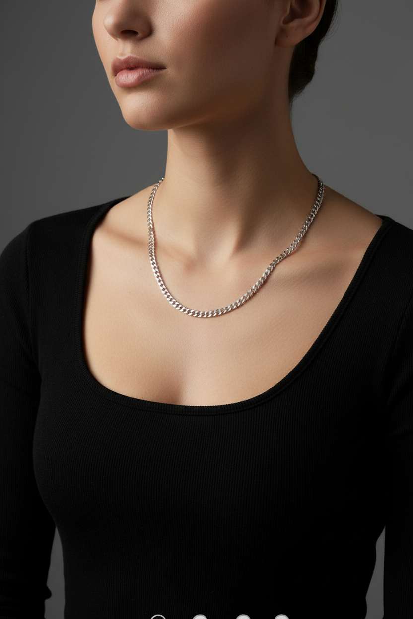 26-inch silver chain on black shirt