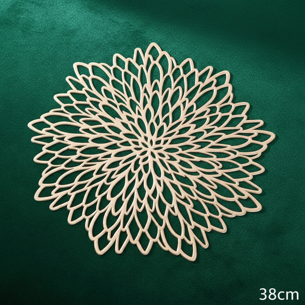 Gold placemat detail on green surface